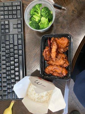 Eating on the job. General Tso Chicken/Steamed Rice/Vegetables