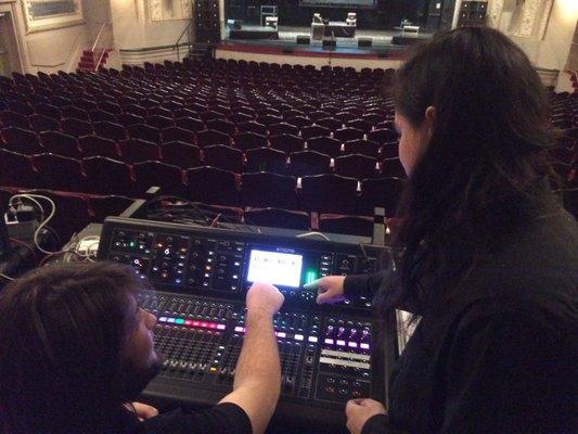 Technical crew setting up cues for show in Ellen Eccles Theatre