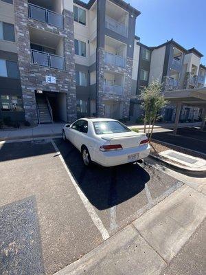 As you can see there are no signs, numbers, nor is it covered there for it is a eligible parking space for the uncovered parking pass.