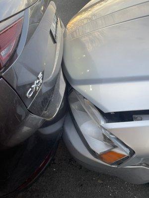 Car behind was wedged into my car!