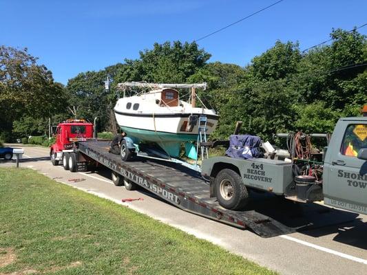 Putting my boat on their trailer.