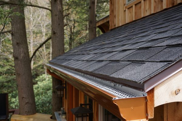 Nealson tree house that was featured on the TV show, Tree house master.  New gutters and leaf  protection with PermaFlow gutter guard