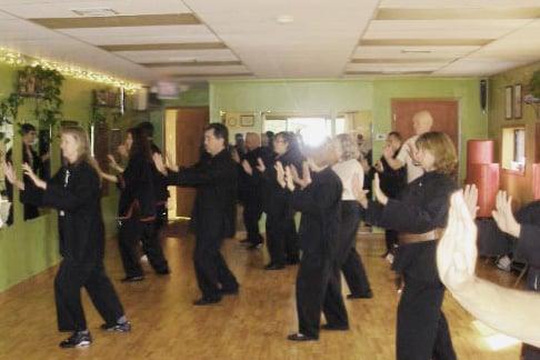 Enjoying tai chi together on a Saturday morning.