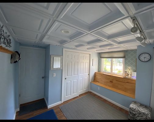 Unfinished room converted to a mudroom.