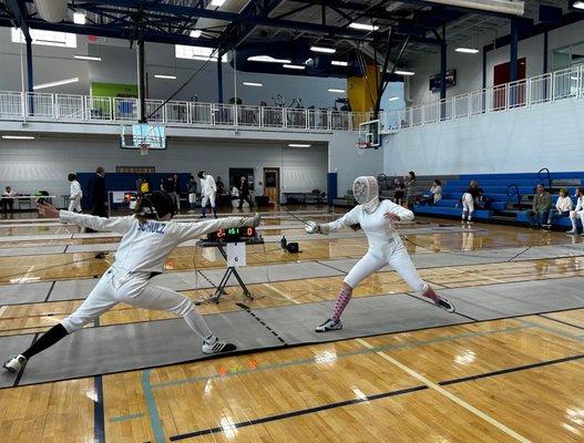 One of our great female fencers from Furman University, Annie.  Winning Gold!