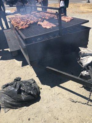 Lots of meats charcoal grilling