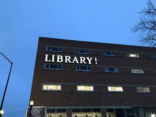 I was so excited to see this sign! It expresses how I feel about libraries! Yay, libraries! How cool-looking is that? Wow!