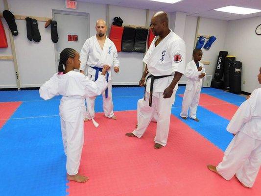 Sensei Randell training in the kids class