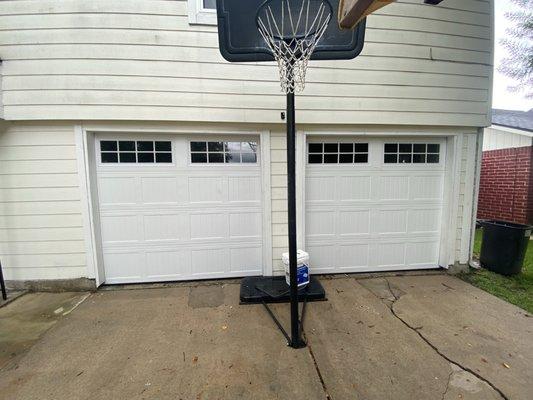 two brand new doors with top window sections to let some natural light in.