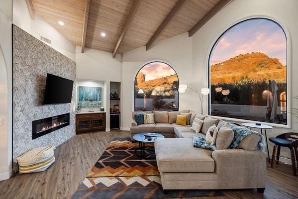 Gret room with comfy sectional and new stone facade fireplace wall.