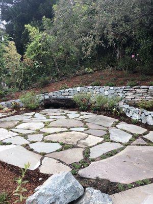 Stone wall and sitting area