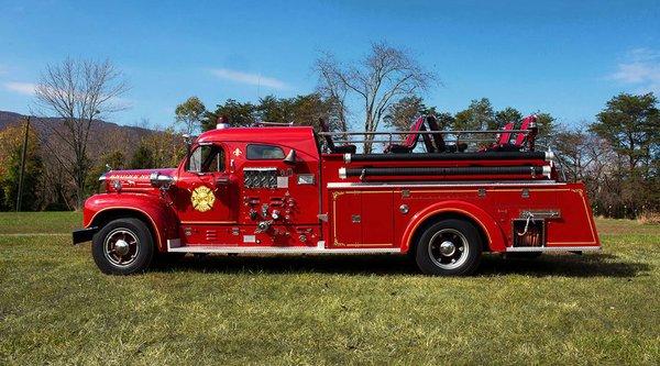 Engine 57. Mack B-85 Thermodyne fire engine with closed cab.