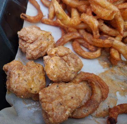 Tiny overcooked dried chicken things, certainly not wings, and overcooked fries as well.