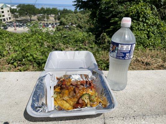 Turkey sausage omelette, with the view from the little park next to the building, dedicated to fresh water