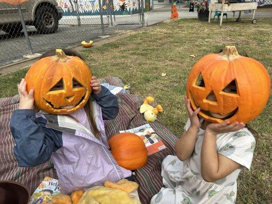 Pumpkin masks at the school harvest festival