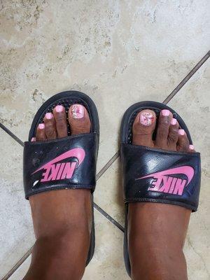 Pedicure gel polish with design on both big toes