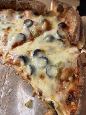 Deep dish with black olives and green pepper