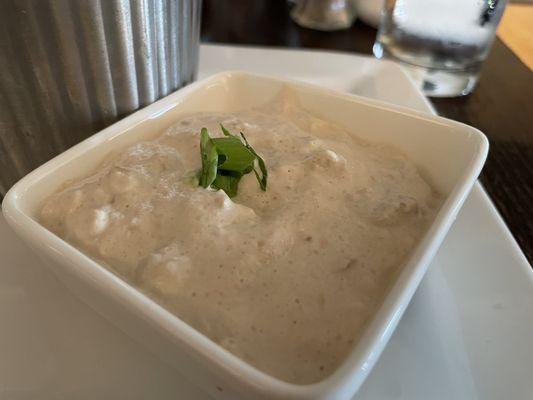 Clam dip that comes with house made salt and vinegar chips. A delightful appetizer