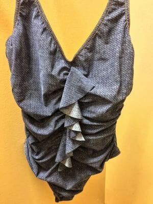 Adorable denim ruffle suit. $300 plus