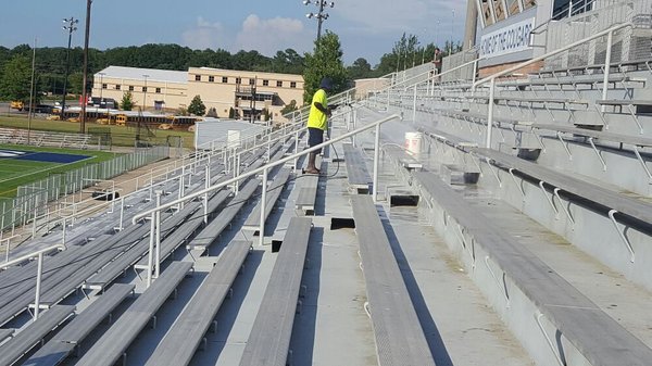 Pressure washing football stadium