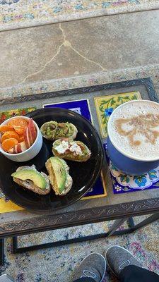 Avocado toast w/fresh fruit and a dirty chai latte