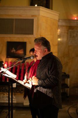 Drew singing at the Renewal of Vows Mass.