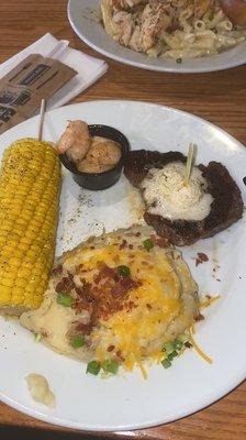 Food described in the review. Steak and shrimp