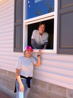 Melissa and Dana volunteering at Habitat Build Day in Walton County