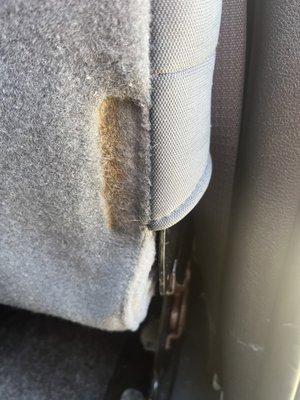 Dirt under my bench seat. Originally thought it was a rust stain but it wiped off with a napkin