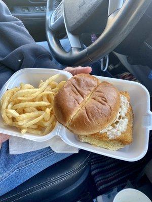 Fish sandwich with tartar and fries