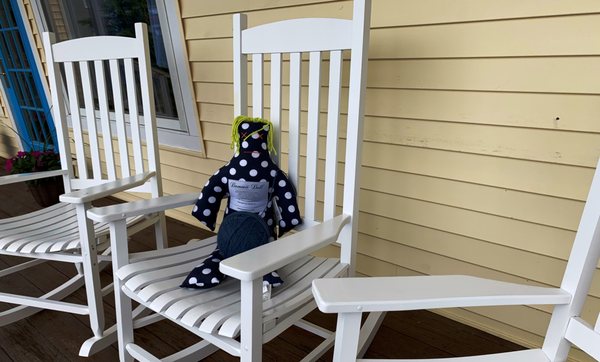 Stop by and knit a while on our inviting porch!