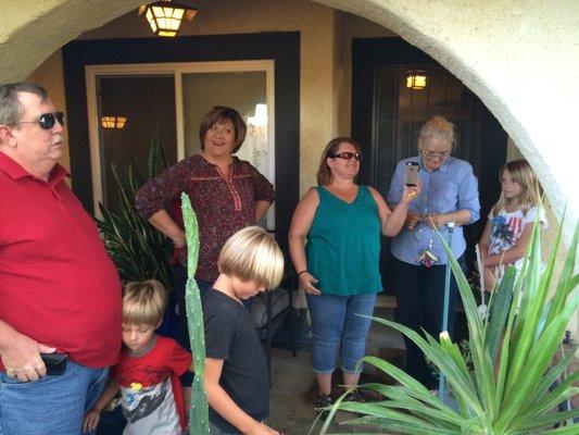 The Neighborhood family coming together to pray.