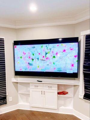 Custom Cabinets add the extra detail! LG 86" 4K TV. Corner installation required precision. Charlotte NC 28209