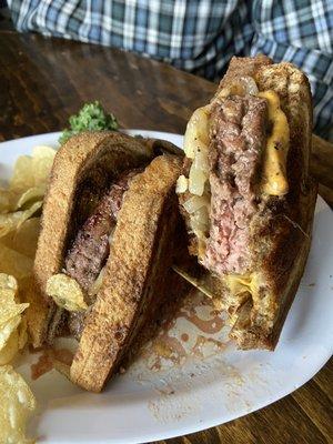 Sweet onion patty melt, cooked medium rare.