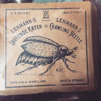 Antique beetle toy