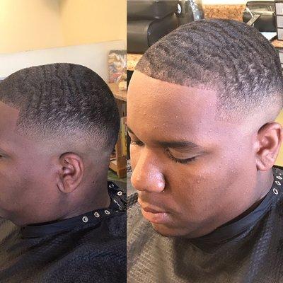 Mid bald-fade haircut