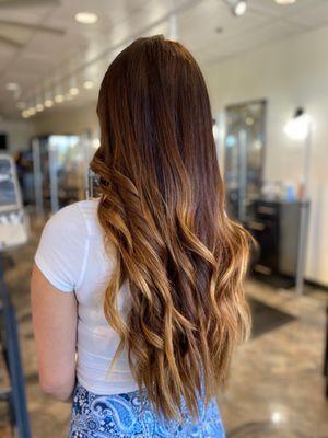 Lived in balayage high lights with long layers performed by Devon