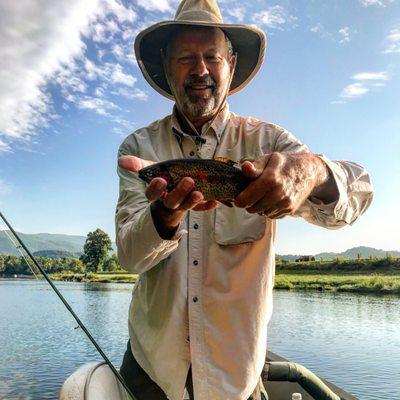 Lin with his first trout on a fly!