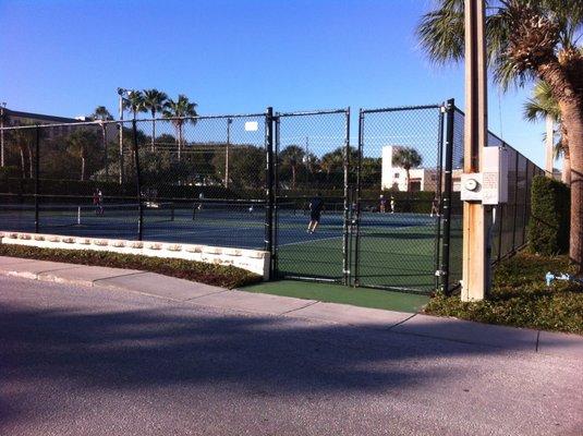 Three lighted tennis courts