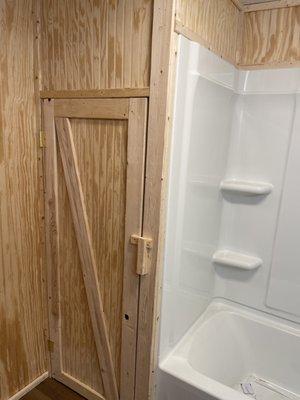 Custom swinging door for lining closet