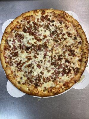 Hand tossed meat lovers pizza (sausage, pepperoni, bacon, beef, and ham)