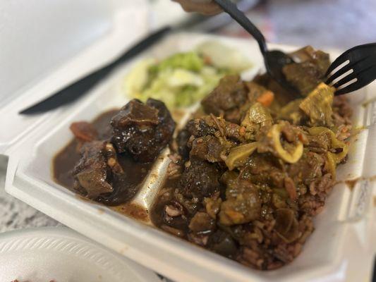 Goat and oxtail + rice&beans and steamed vegies