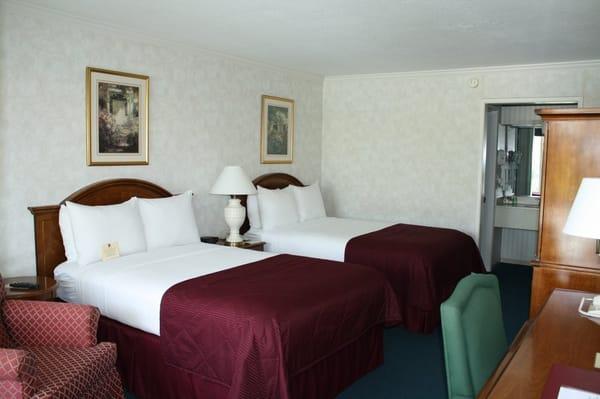 Choose from Two Queens or Double Size Beds.