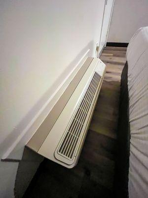 A/c next to bed