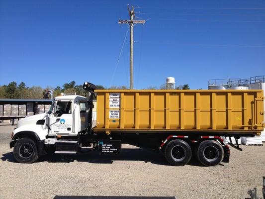 One of our Roll-Off Trucks