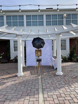 Our Open-Air Photo Booth with our marble backdrop