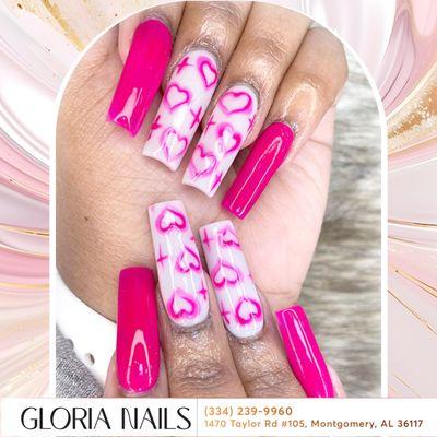 Pink nails with hearts offer a sweet and charming manicure that adds a touch of love to your look.