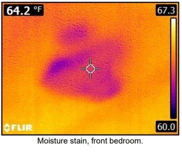 A thermal camera shows a moisture leak.