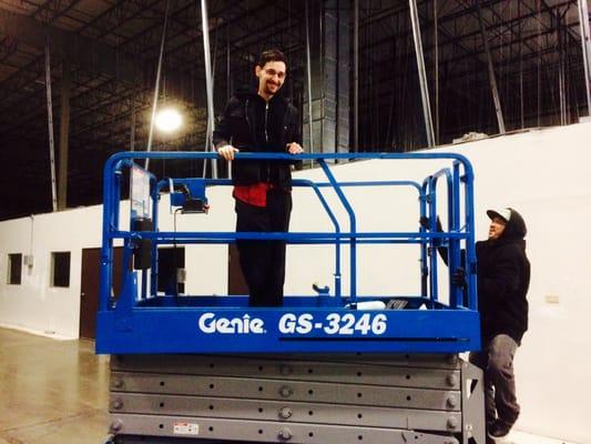 Shane preparing to play on the "BIG BOY" toys. This isn't your grandpas scissor lift. Safety first! Call 209.365.6800 #MCC