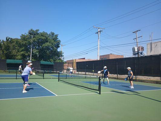 Four pickleball l courts.